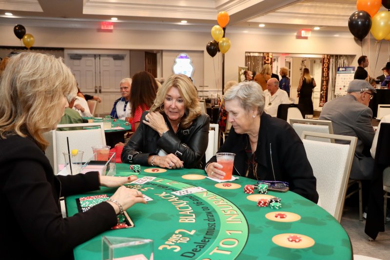 Jackie Blue, left, and Dot Filbert try their luck at the blackjack table during Humane Animal Partners’ fourth annual Casino Night fundraiser Oct. 30 at Baywood Greens. The proceeds support services for rescue dogs and cats at HAP’s Rehoboth Beach and New Castle County facilities.